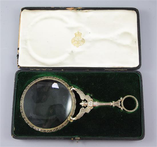 A late 19th century French parcel gilt silver magnifying glass, 7.5in.